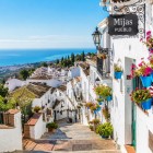 Mijas overlooks the Costa del Sol with its whitewashed houses, flower-filled balconies and scenic streets, preserving the authentic charm of one of Andalusia's most iconic villages.