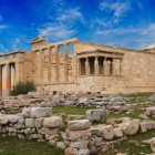 The Erechtheion is home to one of the Acropolis' most captivating treasures: the famous Caryatids, graceful female sculptures that have supported the porch with remarkable elegance for over two thousand years.