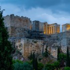 As night falls, the Temple of Athena Nike, the Propylaea and the Monument of Agrippa light up the Acropolis, creating one of Greece's most breathtaking views.