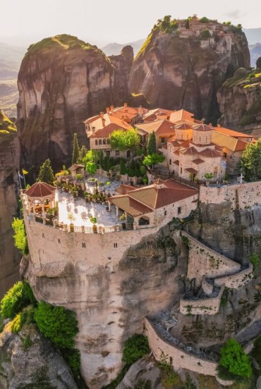 The Holy Monastery of Great Meteoron and Varlaam Monastery rise above the towering rocks of Meteora near Kalambaka, creating one of Greece's most iconic and spiritual landscapes.