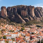 Kalambaka lies at the foot of the towering Meteora cliffs, where red-roofed houses meet one of Greece's most iconic landscapes, the gateway to the famous monasteries perched above.
