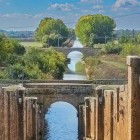 In the heart of Frómista, the Canal of Castile offers one of the region's most iconic views, where historic locks and bridges showcase the remarkable engineering of the Spanish Enlightenment.
