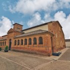 The Church of San Tirso in Sahagún is one of Spain's earliest Mudéjar masterpieces, where brick architecture and history welcome pilgrims on the Camino de Santiago.