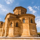The apse of the Church of San Martín de Tours showcases the elegance of Spanish Romanesque architecture, with harmonious forms and finely carved 11th-century details.