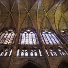 The colorful stained-glass windows of León Cathedral's nave fill the interior with extraordinary light, creating one of the greatest masterpieces of European Gothic art.