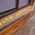 On the window of a house in Sahagún, the words "Buen Camino" greet pilgrims on their way to Santiago, reflecting the hospitality and spirit of the Camino.