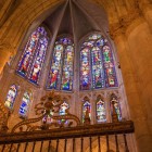 The famous stained-glass windows of León Cathedral fill the interior with light and vibrant colors, creating one of the greatest masterpieces of European Gothic art.