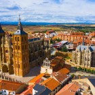 Aerial view of Astorga Cathedral and Gaudí's spectacular Episcopal Palace, two architectural masterpieces at the heart of historic Castile and León.