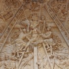 Close-up of the sculpted tympanum of Astorga Cathedral, where biblical figures and exquisite Renaissance reliefs showcase the finest Spanish sacred art.