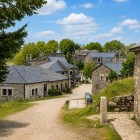 The ancient stone houses of O Cebreiro line the village's quiet streets, where time seems to stand still along the Camino de Santiago.
