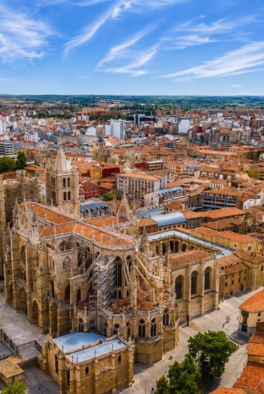 León Cathedral rises above the historic center with its elegant Gothic towers. A UNESCO World Heritage Site on the Camino de Santiago, it is renowned for its magnificent medieval stained glass.