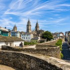 Walking along Lugo's UNESCO-listed Roman Walls, enjoy a beautiful view of Saint Mary's Cathedral and the city's historic centre, an important stop on the Santiago Way.