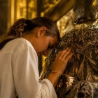 The traditional embrace of the statue of Saint James, behind the High Altar of Santiago Cathedral, is one of the Camino's most meaningful rituals, symbolizing devotion, gratitude and the completion of the pilgrimage.