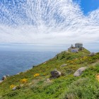 Cape Finisterre overlooks the Atlantic Ocean with dramatic cliffs and flowering meadows, in the place that for centuries was believed to be the end of the world.