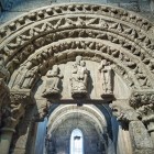The Romanesque portal of the Corticela Chapel in Santiago de Compostela Cathedral preserves elegant medieval sculptures and remarkable symbols of faith.