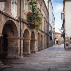 Lined with stone arcades and narrow cobbled streets, the pedestrian historic centre of Santiago de Compostela invites visitors to stroll through centuries of history and authentic Galician life.