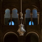 The Botafumeiro hangs in the nave of Santiago de Compostela Cathedral, ready to soar during the Pilgrim's Mass, a symbol of a centuries-old tradition.