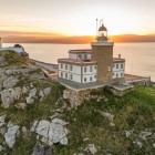 Cape Finisterre Lighthouse rises on a rocky peninsula overlooking the Atlantic, in the place once considered the legendary “end of the world”.