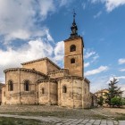 The Romanesque apse of the Church of San Millán reflects Segovia's medieval origins. Its solid stone walls and elegant bell tower make it one of Castile's finest Romanesque landmarks.