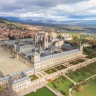 The Royal Monastery of El Escorial rises above the Sierra de Guadarrama with perfect symmetry, reflecting Philip II's vision and the grandeur of the Spanish Renaissance.