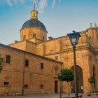 The Clerecía Church is one of the finest examples of Spanish Baroque architecture in Salamanca. Its imposing dome and elegant façade reflect the prestige of the former Royal College of the Society of Jesus.