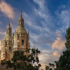 The Baroque bell towers of La Clerecía Church rise gracefully above Salamanca's skyline. Built for the Society of Jesus, the church is one of the finest examples of Spanish Baroque architecture.