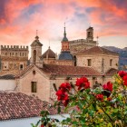 The Royal Monastery of Santa María de Guadalupe rises above the historic town with its towers and rooftops, a UNESCO World Heritage Site in the heart of Cáceres province, Extremadura.