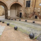 The historic City Gate opens onto Plaza Santa Lucía, one of Plasencia's most authentic corners, where stone arches and ancient walls recall the city's medieval past.
