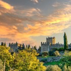 The city of Trujillo stretches across the Extremadura landscape, dominated by its Islamic castle with robust defensive walls, crenellated towers and ancient wall walks.