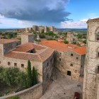 From above, Trujillo’s historic centre reveals terracotta roofs, stone palaces and the Romanesque tower of Santa María la Mayor, while the castle dominates the Extremadura skyline.