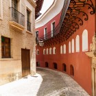 The picturesque, winding Callejón de Jesús y María runs beside the former convent and links Calle Trinidad to Calle Alfonso XII; until 1985, the Corpus Christi procession passed here.