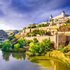 Toledo’s old town skyline rises above the Tagus, where walls, towers and historic palaces outline the profile of Spain’s celebrated City of Three Cultures.