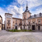 Historic Plaza de la Villa preserves three centuries of Madrid architecture: the Gothic-Mudéjar Lujanes Tower, the Plateresque Casa de Cisneros and the Baroque Casa de la Villa.