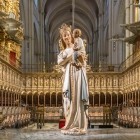 The Virgen Blanca, a 14th-century Gothic alabaster sculpture, welcomes visitors to Toledo Cathedral’s choir: Mary smiles as the Christ Child gently caresses her face.