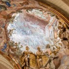Narciso Tomé’s Transparente blends architecture, sculpture and fresco: an oculus cut into the vault casts natural light over angels, marble and stucco in the Spanish Baroque style.