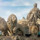 The goddess Cybele drives a chariot drawn by two lions, symbols of Hippomenes and Atalanta: sculpted in the 18th century, the fountain is now one of Madrid’s most recognisable landmarks.