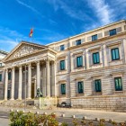 The Congress of Deputies, opened in 1850, features a Neoclassical façade with a Corinthian portico and sculpted pediment; its famous bronze lions guard the entrance.