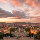 From Montjuïc Hill, the panorama embraces Barcelona along the monumental axis running past fountains, the Four Columns and the Venetian Towers to Plaça d’Espanya.