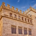 The façade of the Silk Exchange resembles a medieval fortress: battlements, towers and tracery windows celebrate the wealth of the merchants who made Valencia a Mediterranean power.