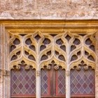 A window of the Lonja de la Seda reveals the refinement of Valencian Gothic: stone tracery, interlaced arches and stained glass reflect the artistry of 15th-century masters.