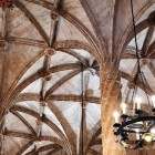 In the Hall of Columns of the Silk Exchange, spiral pillars open into ribbed vaults resembling stone palms, a masterpiece of Valencian civil Gothic architecture.