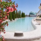 Gardens, oleanders and reflecting pools surround the Palau de les Arts in the City of Arts and Sciences, creating a scenic walk through the modern face of Valencia.