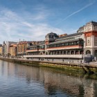 Overlooking the Bilbao Estuary, Mercado de la Ribera blends Art Deco architecture, large windows and culinary tradition in the historic Old Town.