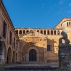 A 12th-century Romanesque jewel, the Collegiate Church of Santa Juliana features an arched portal with archivolts, a Pantocrator frieze and an atrium guarded by stone lions.
