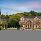 Sobrellano Palace overlooks the gardens of Comillas with Neo-Gothic façades, sculpted loggias and side towers, beside the soaring Chapel-Pantheon of the Marquises.