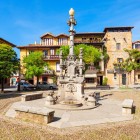 Fuente de los Tres Caños, a Modernist fountain designed by Domènech i Montaner, featuring stonework, ornamental motifs and a strongly symbolic composition.