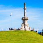 The Monument to the Marquis of Comillas rises above the hill: Domènech i Montaner blends stone and sculpture in a striking view over the Cantabrian coast.