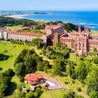 The former Pontifical University has overlooked Comillas since 1883: designed by Joan Martorell and decorated by Domènech i Montaner, it blends Neo-Gothic, Mudéjar and Modernism.