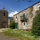 In O Cebreiro, the 9th-century Pre-Romanesque sanctuary of Santa María A Real stands beside San Giraldo de Aurillac’s pilgrims’ hospice.