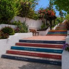 Along Paseo de San Amaro in Puerto de la Cruz, steps dedicated to Agatha Christie’s novels lead towards Mirador de La Paz through subtropical gardens.